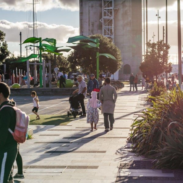 Families enjoying leisure time in the Silo Park playground in Wynyard Quarter, Auckland's city centre. Image: Sacha Stejko.