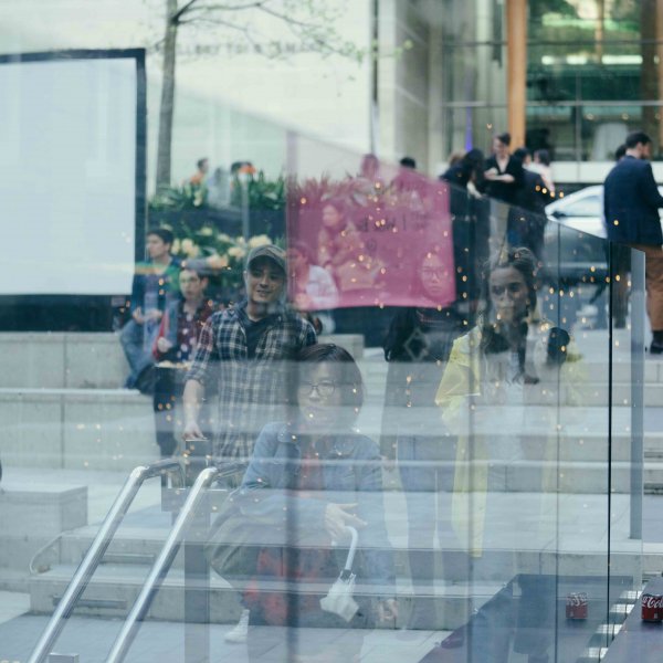 People gathered and talking outside Auckland Art Gallery in Auckland City Central during Art Week